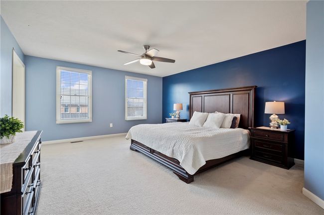 The spacious primary suite is a relaxing retreat. | Image 14