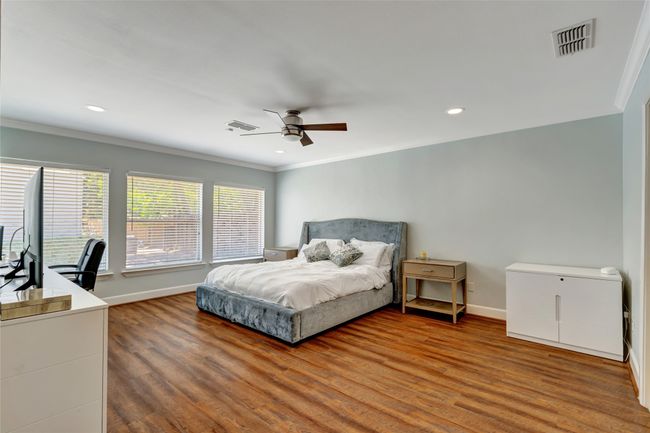 Primary bedroom filled with light | Image 19