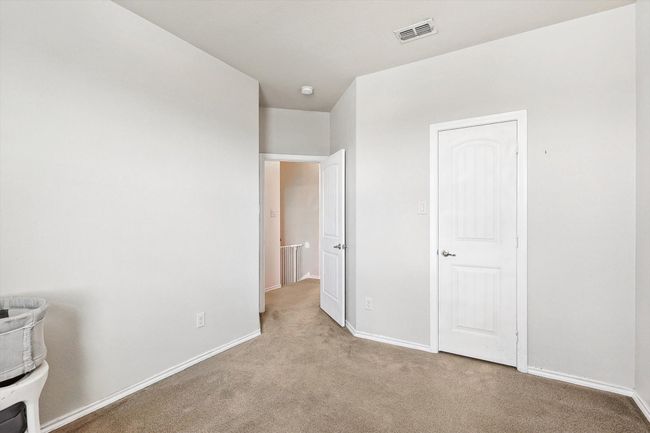 Unfurnished bedroom featuring carpet flooring and baseboards | Image 25