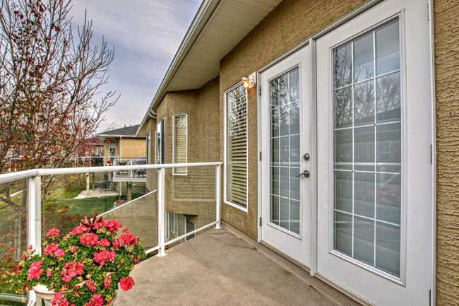 37 Rowland Lane, Home with 3 bedrooms, 2 bathrooms and 2 parking in Okotoks AB | Image 38