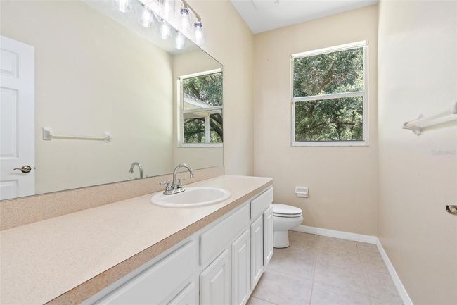 11933 Pasco Trails Blvd, House other with 4 bedrooms, 3 bathrooms and null parking in SPRING HILL FL | Image 24