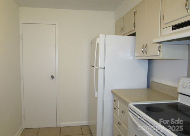 Kitchen with view of pantry/closet | Image 14