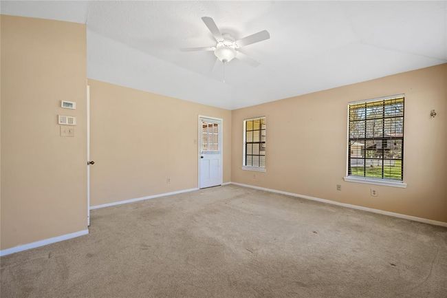 Primary Bedroom with Door to Sunroom | Image 22