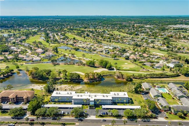 Drone / aerial view with view of golf course, a water view, and a residential view | Image 40