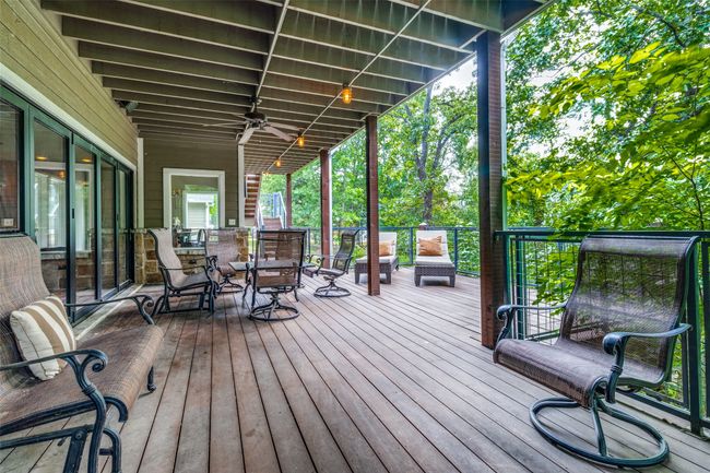 Wooden deck featuring ceiling fan | Image 32