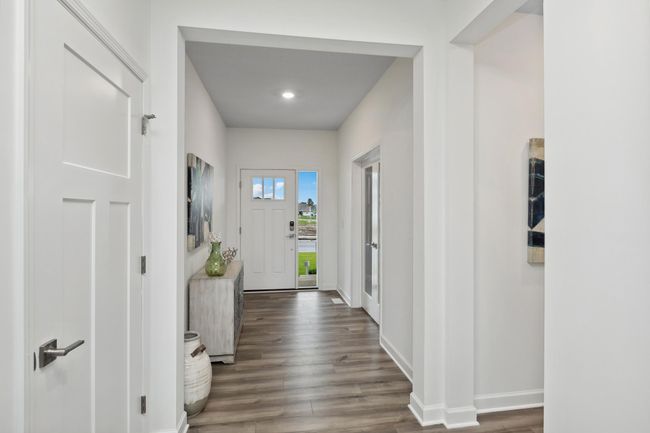 Photo is of the actual model. Make the best first impression with this bright and open foyer. | Image 9