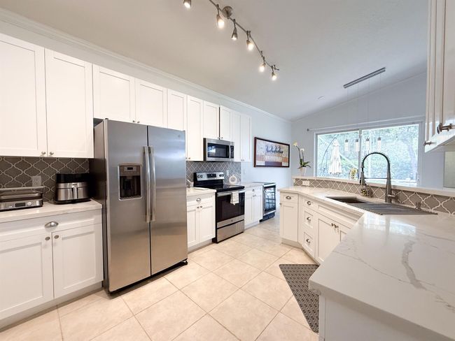 4803 Nw 59 Th Ct, House other with 3 bedrooms, 2 bathrooms and null parking in Coconut Creek FL | Image 4