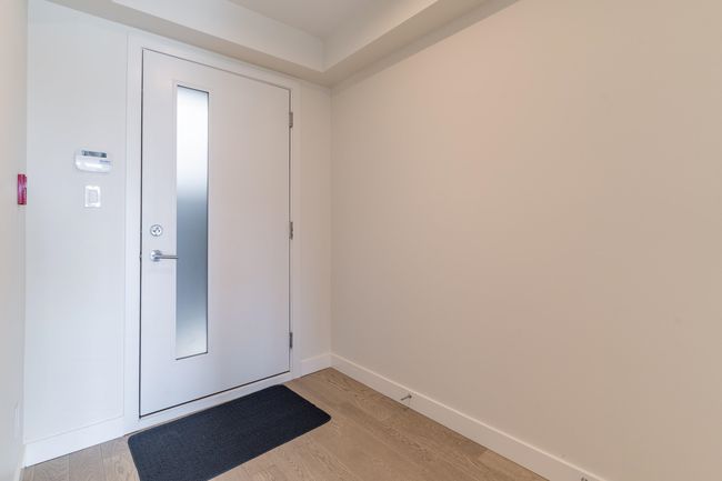Hallway featuring baseboards, light wood-style floors, and recessed lighting | Image 20