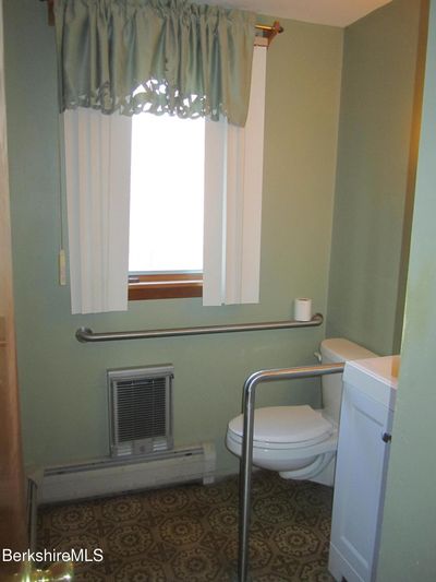 Convenient 1st floor half bath off kitchen | Image 3