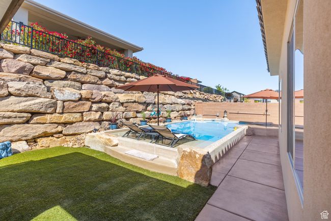 View of swimming pool featuring a patio | Image 19