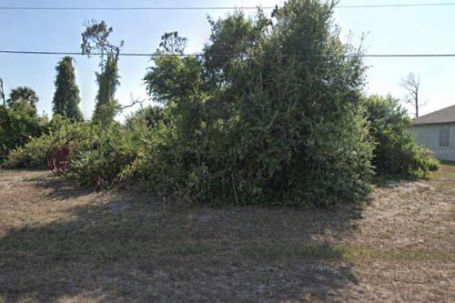 297 Australian Dr, Rotonda West, FL, 33947-4820 | Card Image