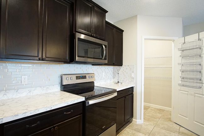 1672 Sw Bascom Ave, House other with 4 bedrooms, 2 bathrooms and null parking in Port Saint Lucie FL | Image 9