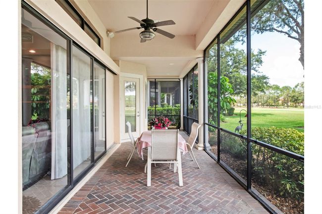 Screened in back porch with hiding sliding back doors. | Image 24