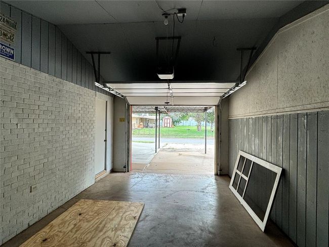 Garage with a garage door opener | Image 45