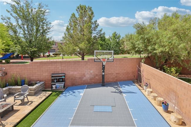 View of sport court featuring basketball court | Image 68