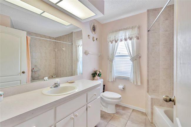 spare bath from hallway | Image 19