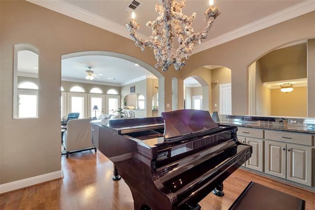 Built in buffet with cabinets for extra storage. | Image 26