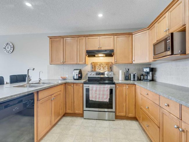 221 Ranch Ridge Crt, Home with 4 bedrooms, 3 bathrooms and 4 parking in Strathmore AB | Image 9