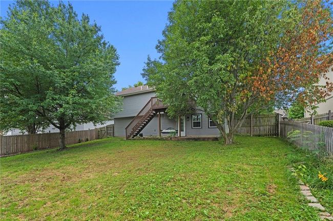 Fenced backyard featuring stairway and a deck | Image 40