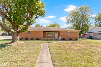 Full wrap brick ranch on spacious corner lot | Image 1