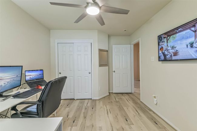 The optional 3rd bedroom/study with view of closet space and door to hallway. | Image 29