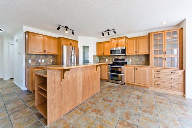 97 Gleneagles Terrace, Home with 4 bedrooms, 3 bathrooms and 4 parking in Cochrane AB | Image 23