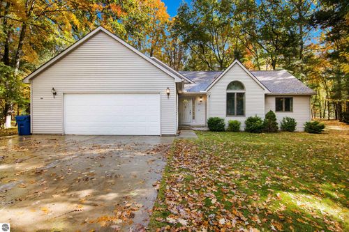 5481 Timberwyck Trl, Interlochen, MI, 49643-9514 | Card Image