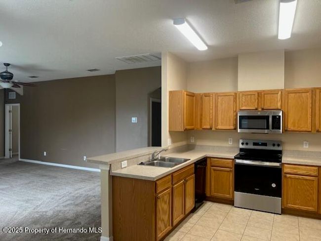 4182 Maplehurst Way, House other with 4 bedrooms, 3 bathrooms and null parking in Spring Hill FL | Image 5