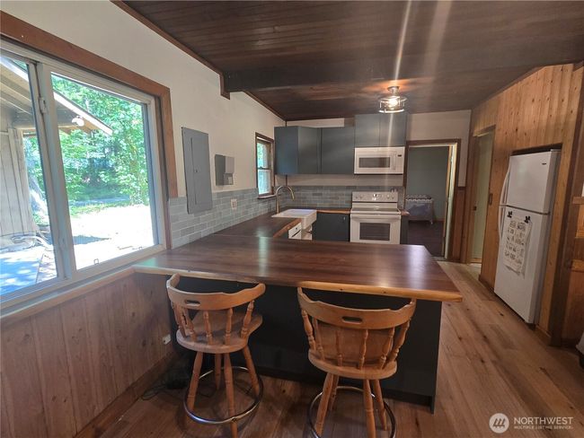 View of kitchen from dining room space. | Image 13