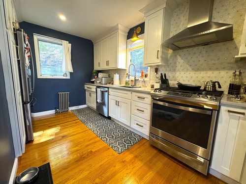 65 Whitford St., Boston, MA, 02131 | Card Image