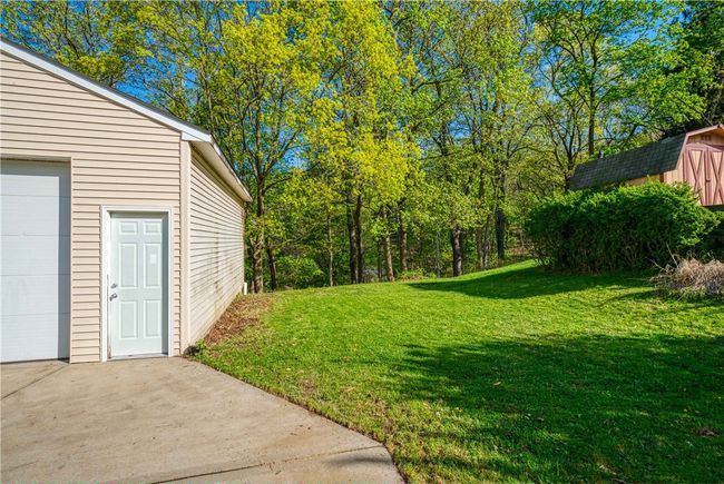 Back yard abuts wooded area providing good privacy. | Image 27