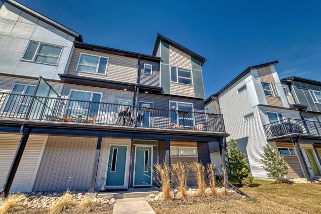 247 Redstone Boulevard Ne, Home with 3 bedrooms, 2 bathrooms and 3 parking in Calgary AB | Image 1