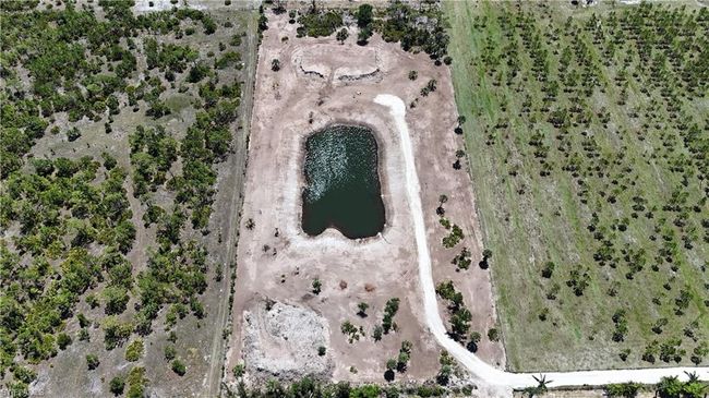 View of property location with a nearby body of water | Image 20