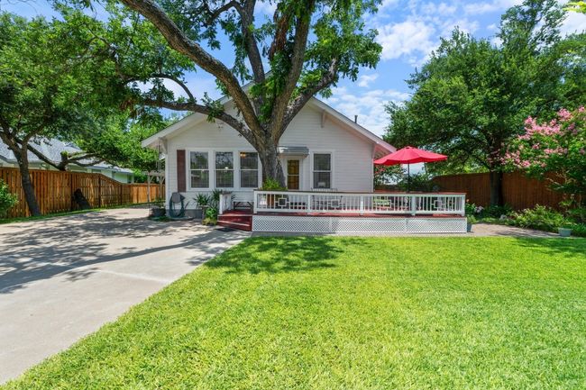 Rear view of property featuring a deck | Image 24