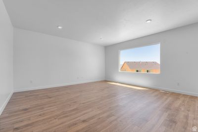 Unfurnished room featuring light wood-type flooring | Image 3