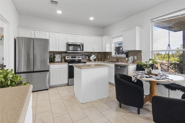 13524 Lyndon B Johnson St, House other with 3 bedrooms, 3 bathrooms and 2 parking in Manor TX | Image 13