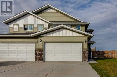 50 Ranchers Close, Home with 3 bedrooms, 3 bathrooms and null parking in Lacombe AB | Image 1