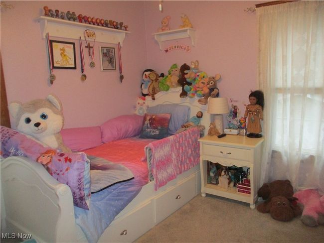 Bedroom with light carpet | Image 25