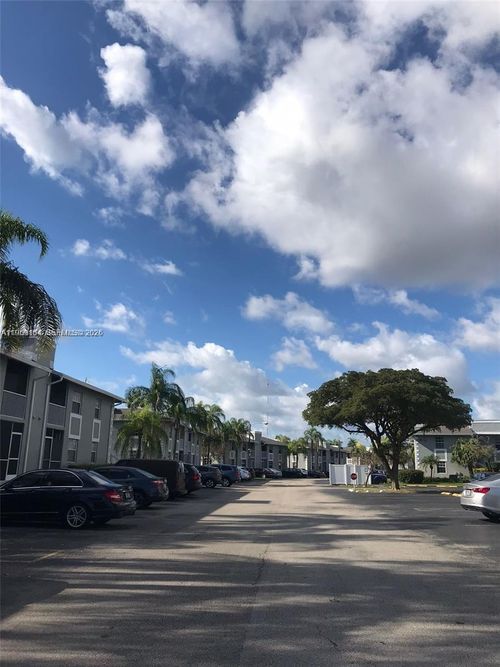 203-22-439 Ne 210th Circle Ter, Miami, FL, 33179-5220 | Card Image