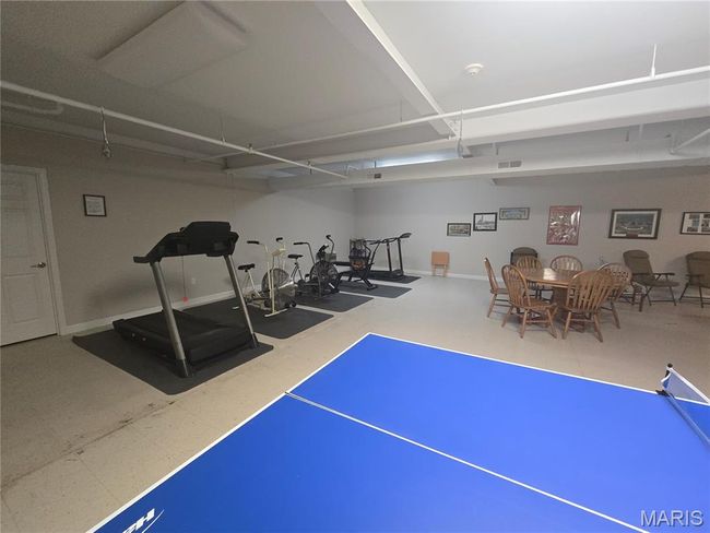Workout area with some equipment | Image 28