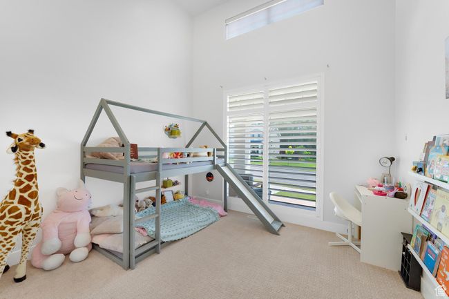 Bedroom 3 featuring carpet floors and multiple windows | Image 19