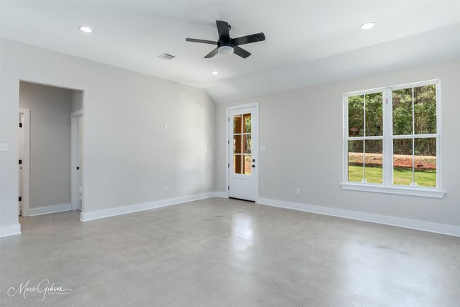 Spare room featuring baseboards, concrete floors, a ceiling fan, and recessed lighting | Image 18
