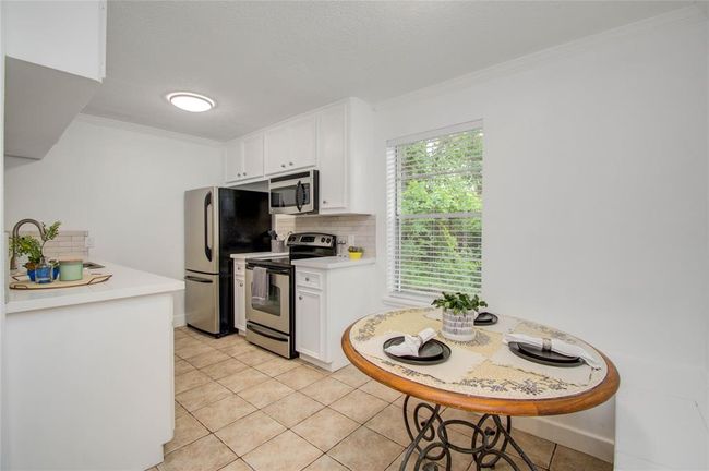 Built-in dining benches include storage room | Image 7