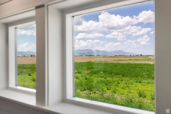 View of mountain backdrop featuring rural landscape | Image 8