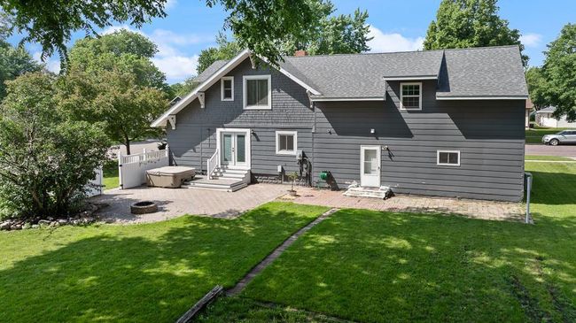 Spacious backyard with a large patio for endless entertaining and relaxation! | Image 7