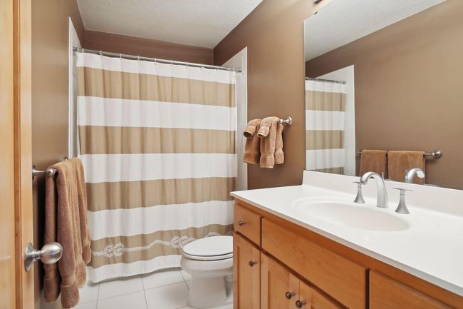 Full bathroom on upper level w/ great tiled floors!! | Image 32