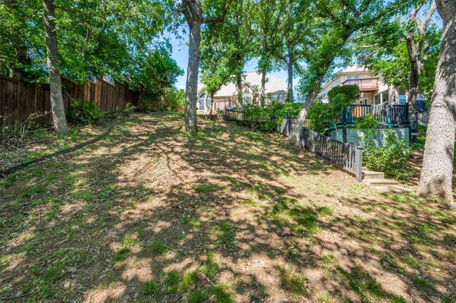 View of yard with a fenced backyard | Image 33