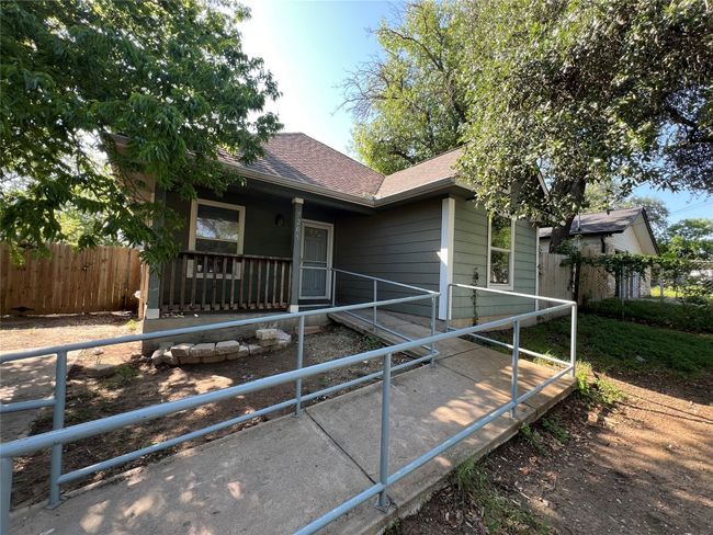 View of front of house featuring roof with shingles and fence | Image 6