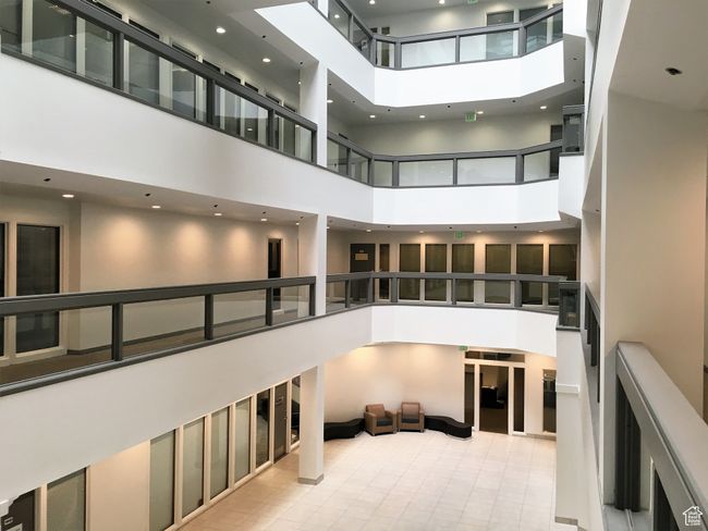 Building lobby with a high ceiling and recessed lighting | Image 8