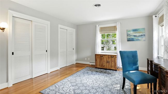 Office featuring light wood-style flooring and baseboard heating | Image 24